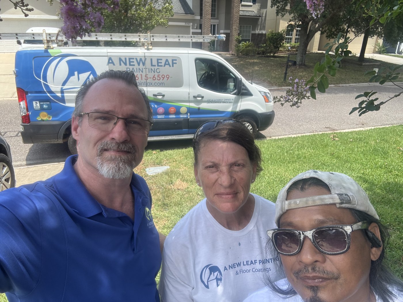 Thomas Drake with two of the A New Leaf crew in front of the company van