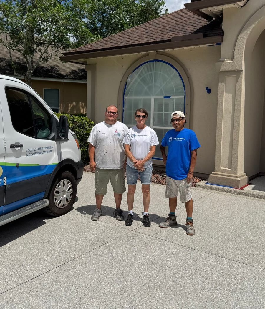 The A New Leaf Painting crew with their van outside a home