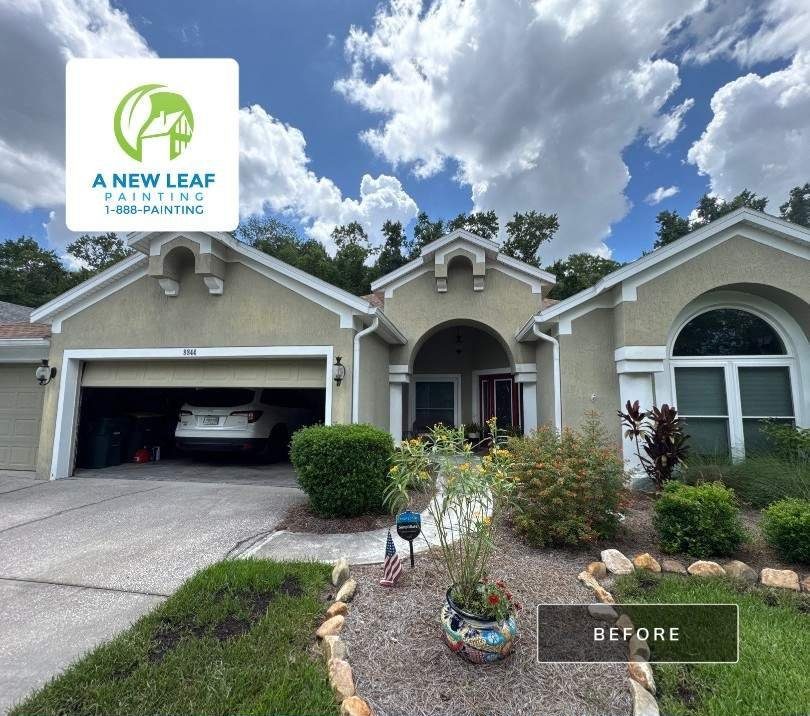 A Hampton Park stucco home with faded, chalking exterior paint before the repaint, Jacksonville FL