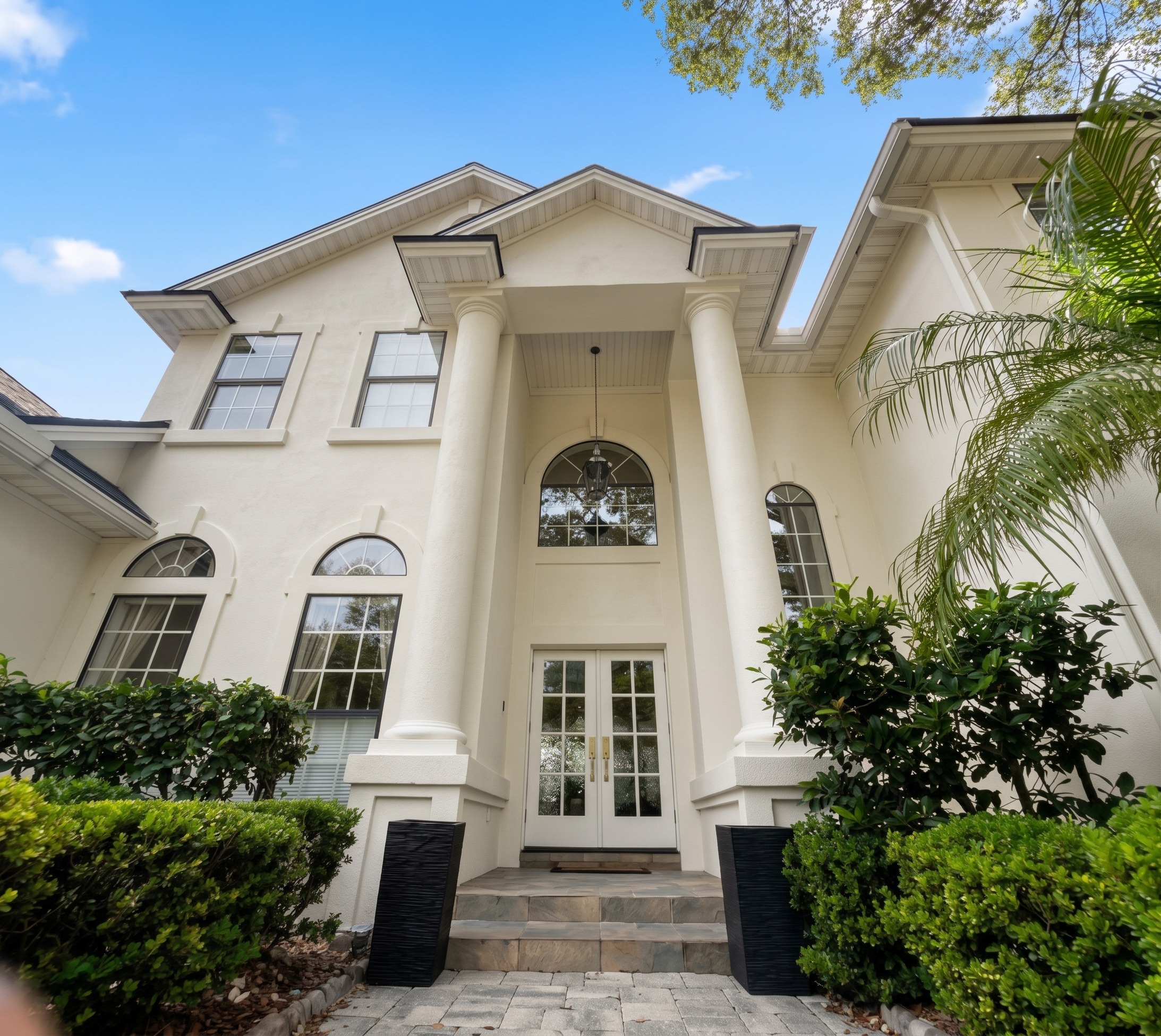 After the Large Stucco Home Exterior Painting in Marsh Landing | Ponte Vedra Beach, FL in Ponte Vedra Beach, FL