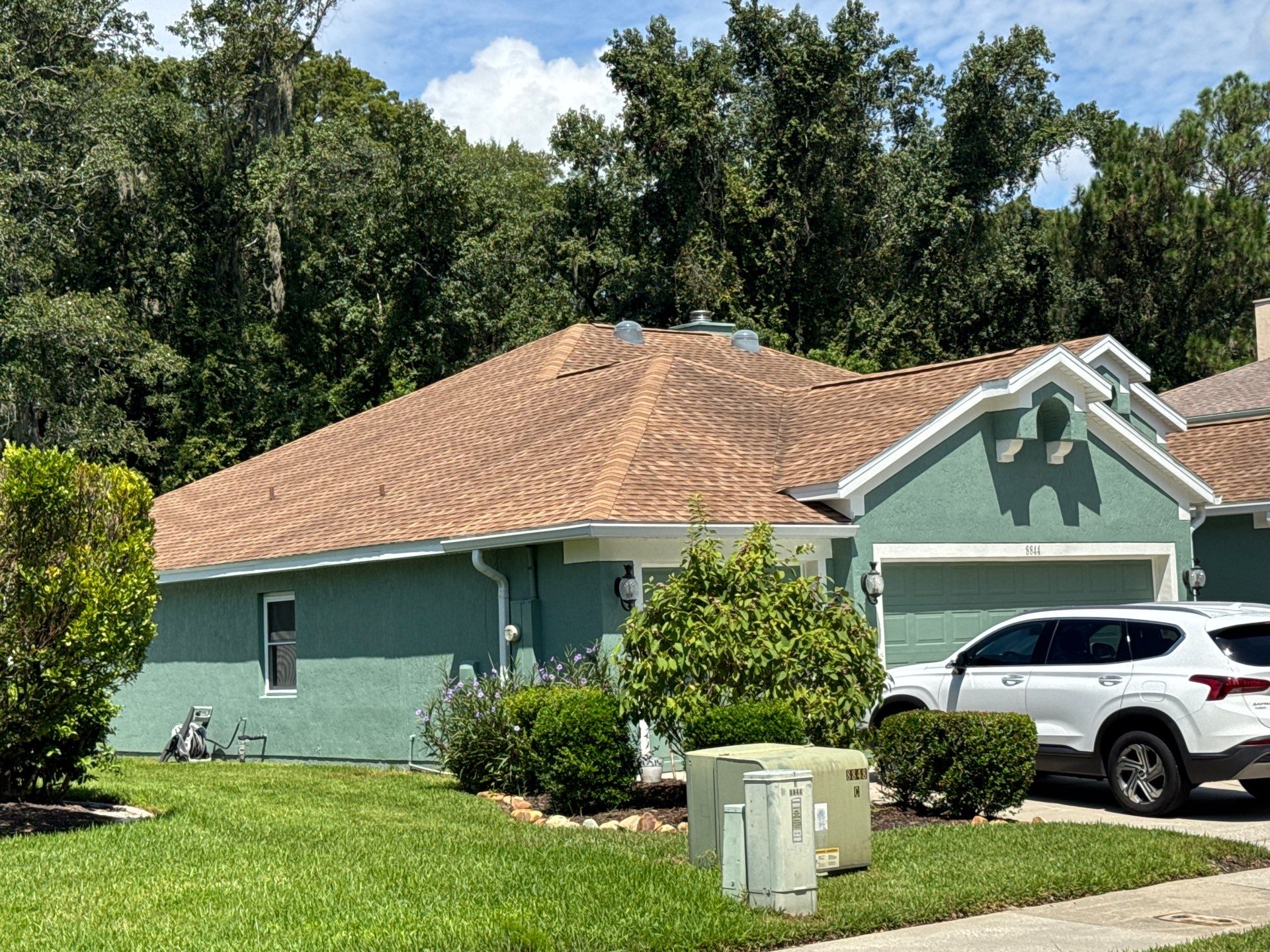 The Stucco Exterior Repainting with White Soffits & Fascia | Hampton Park, Jacksonville, FL in Jacksonville, FL