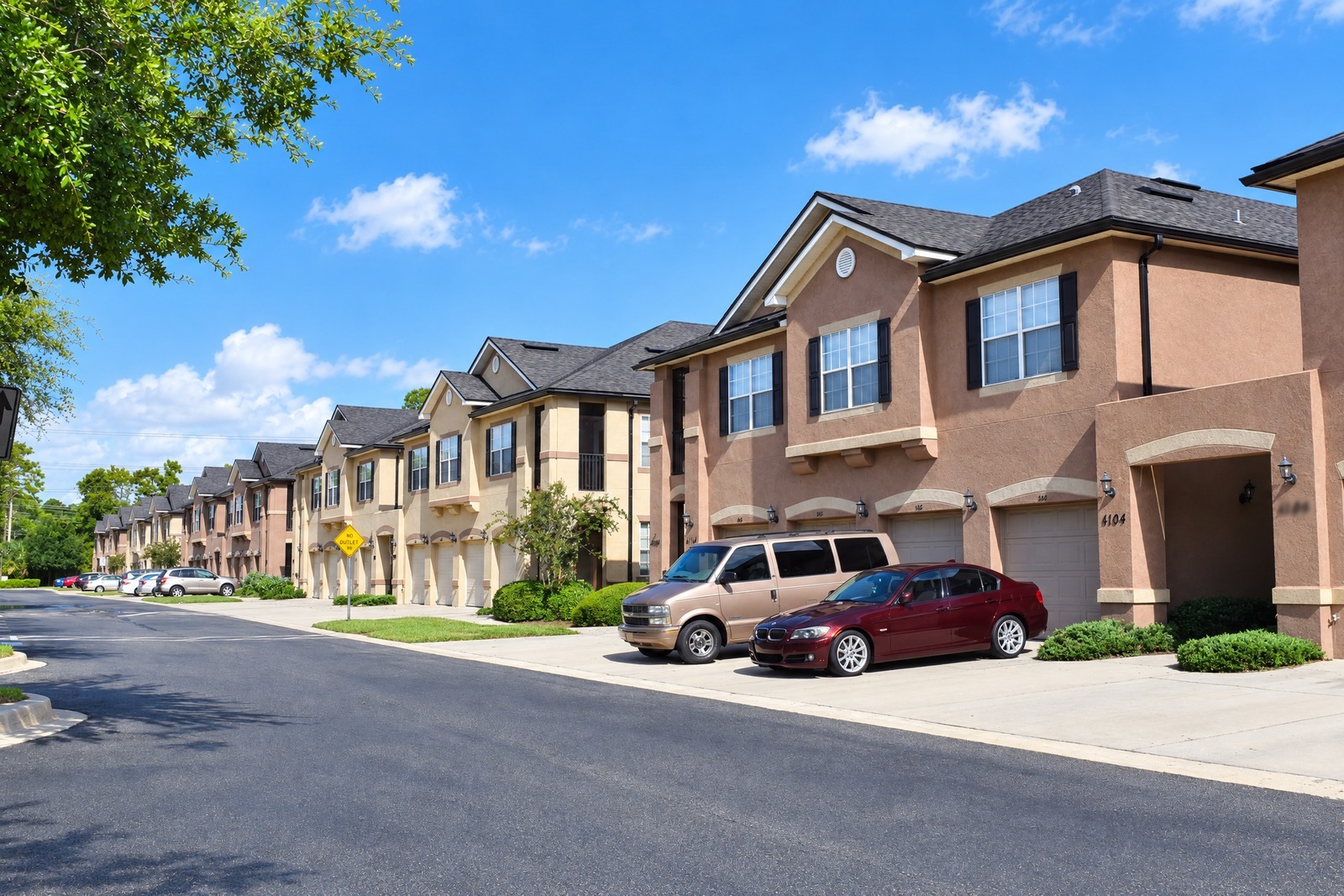Row of townhomes after HOA exterior painting, Jacksonville FL
