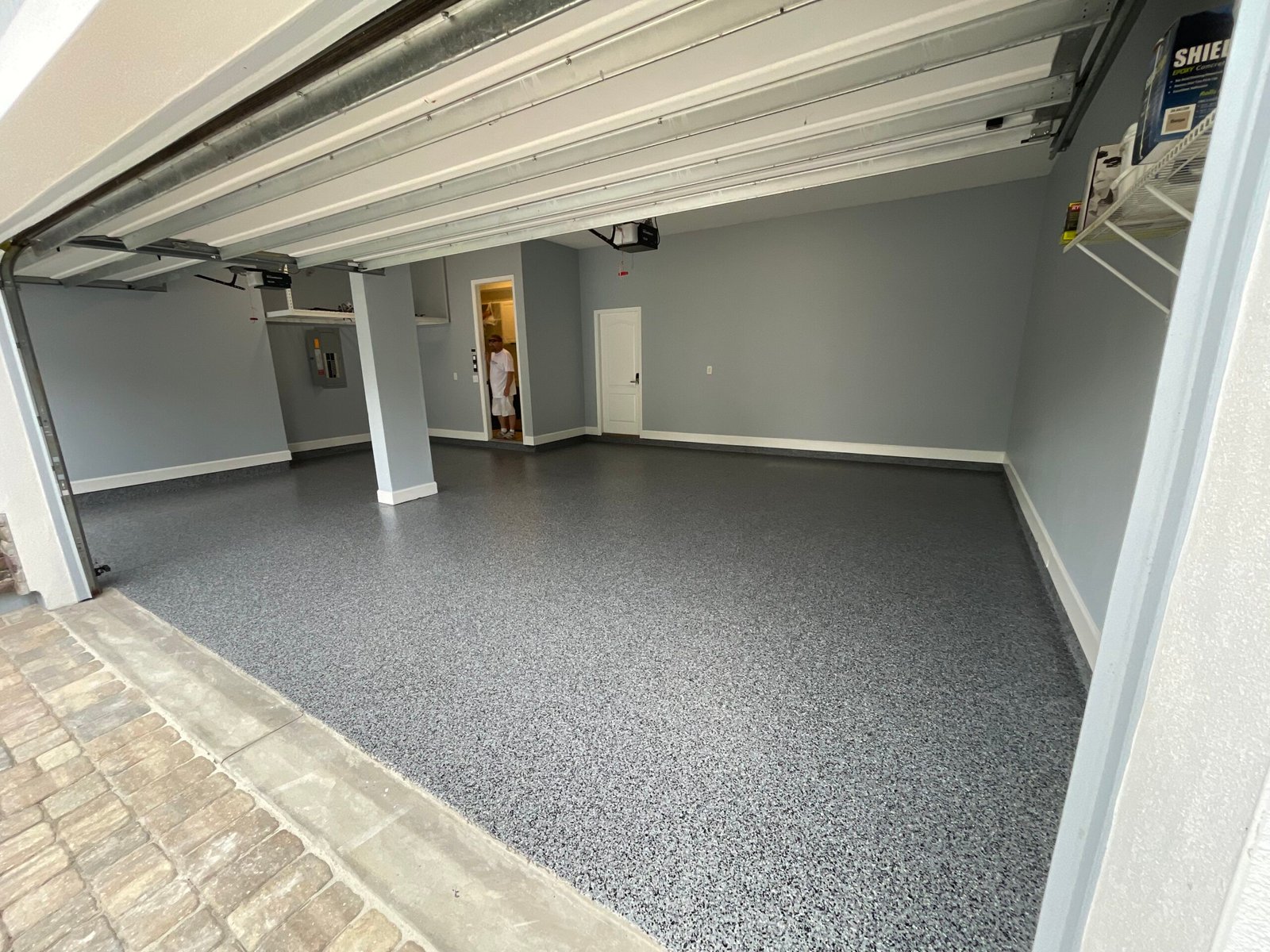 Epoxy and polyaspartic garage floor coating completed at a Nocatee home