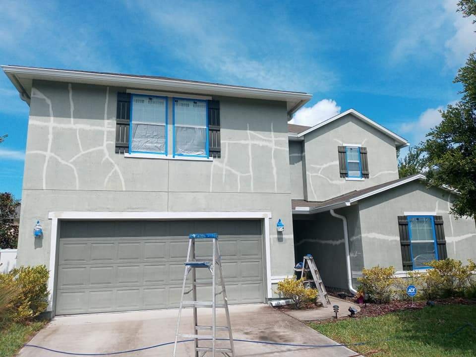 Stucco exterior with crack repair patches before painting, Mandarin, Jacksonville FL 32223