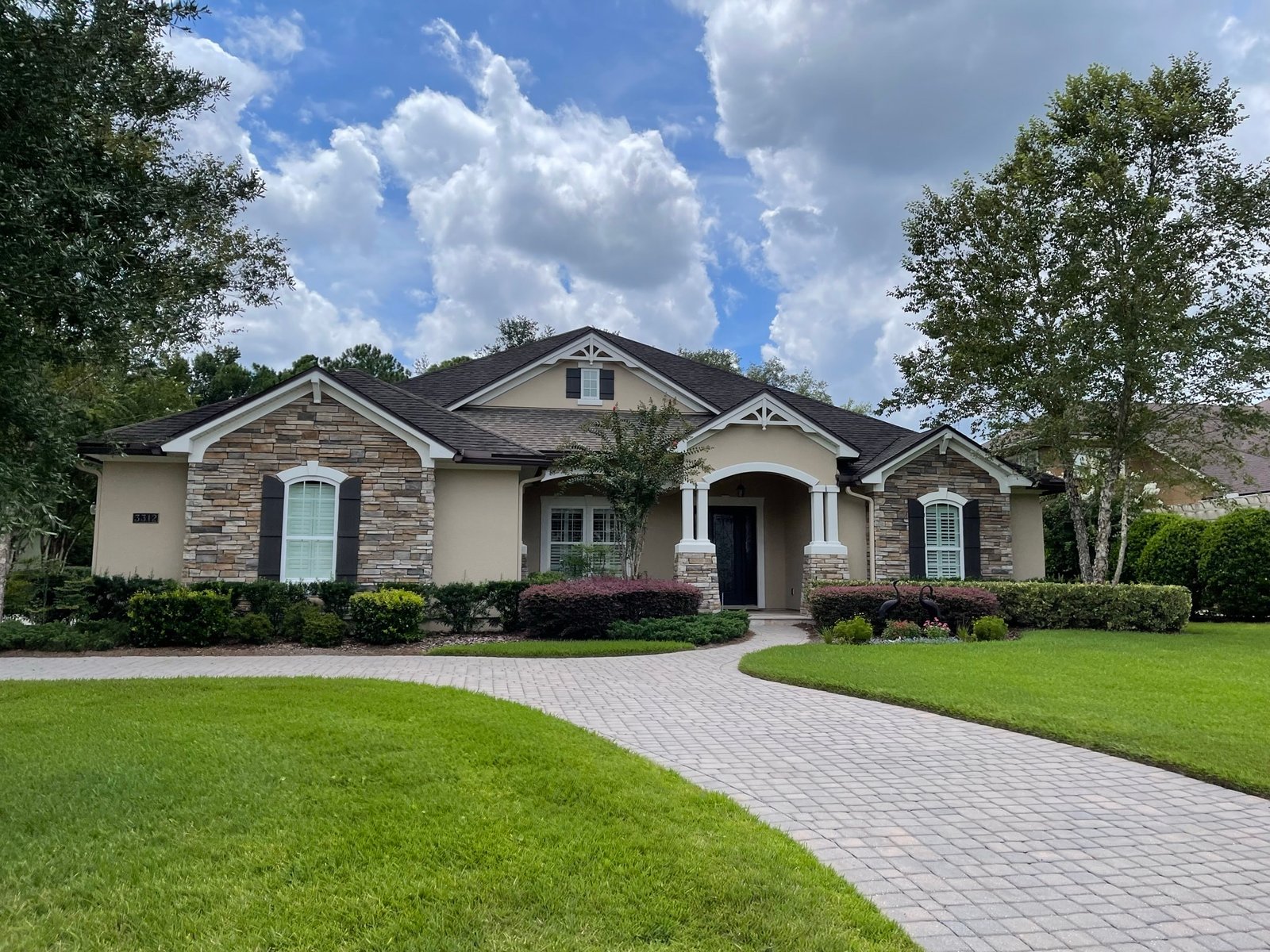 Exterior painting of conventional stucco home in King and Bear at World Golf Village Florida