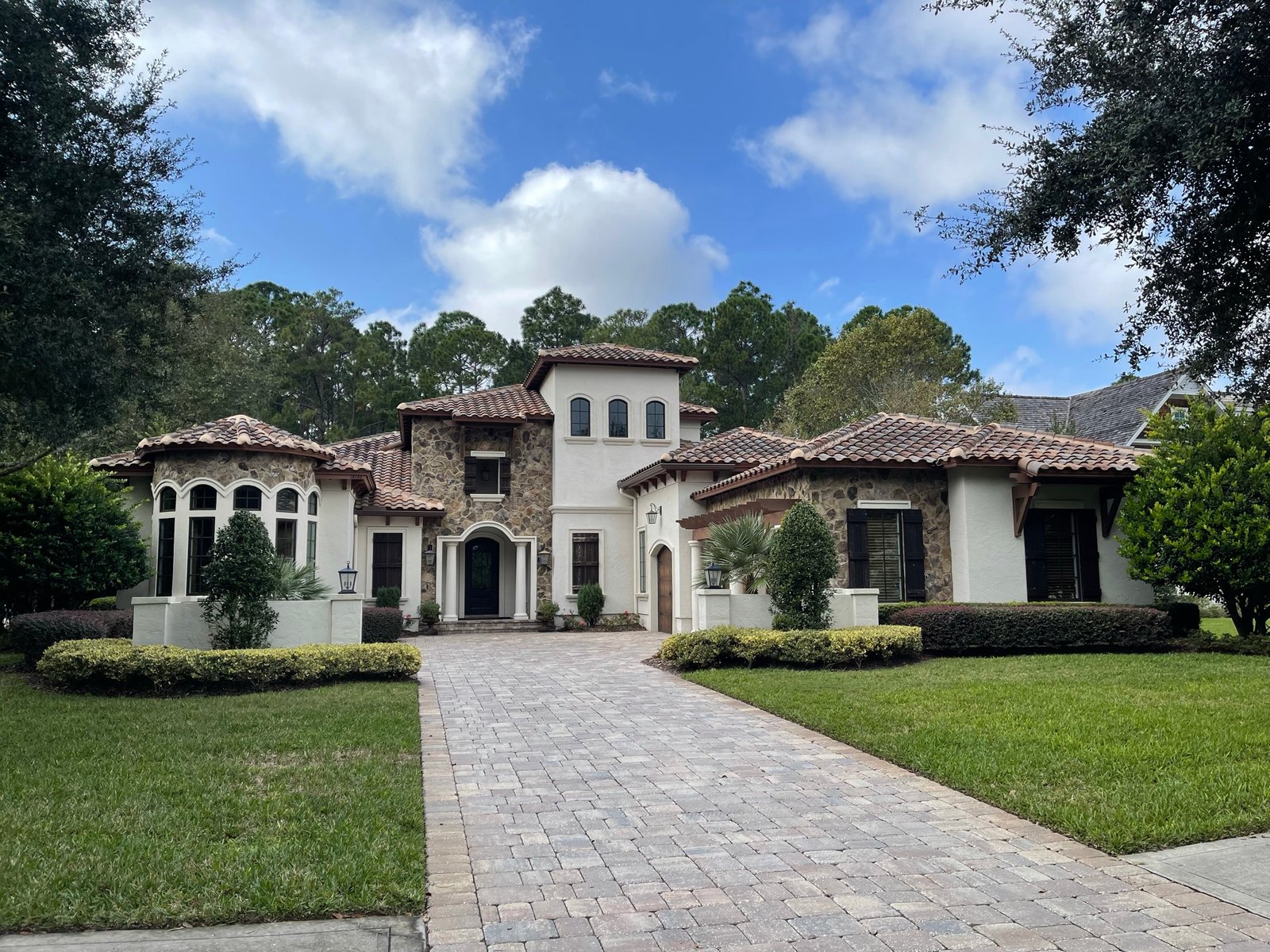 Exterior repaint of a synthetic stucco home in King and Bear, World Golf Village FL