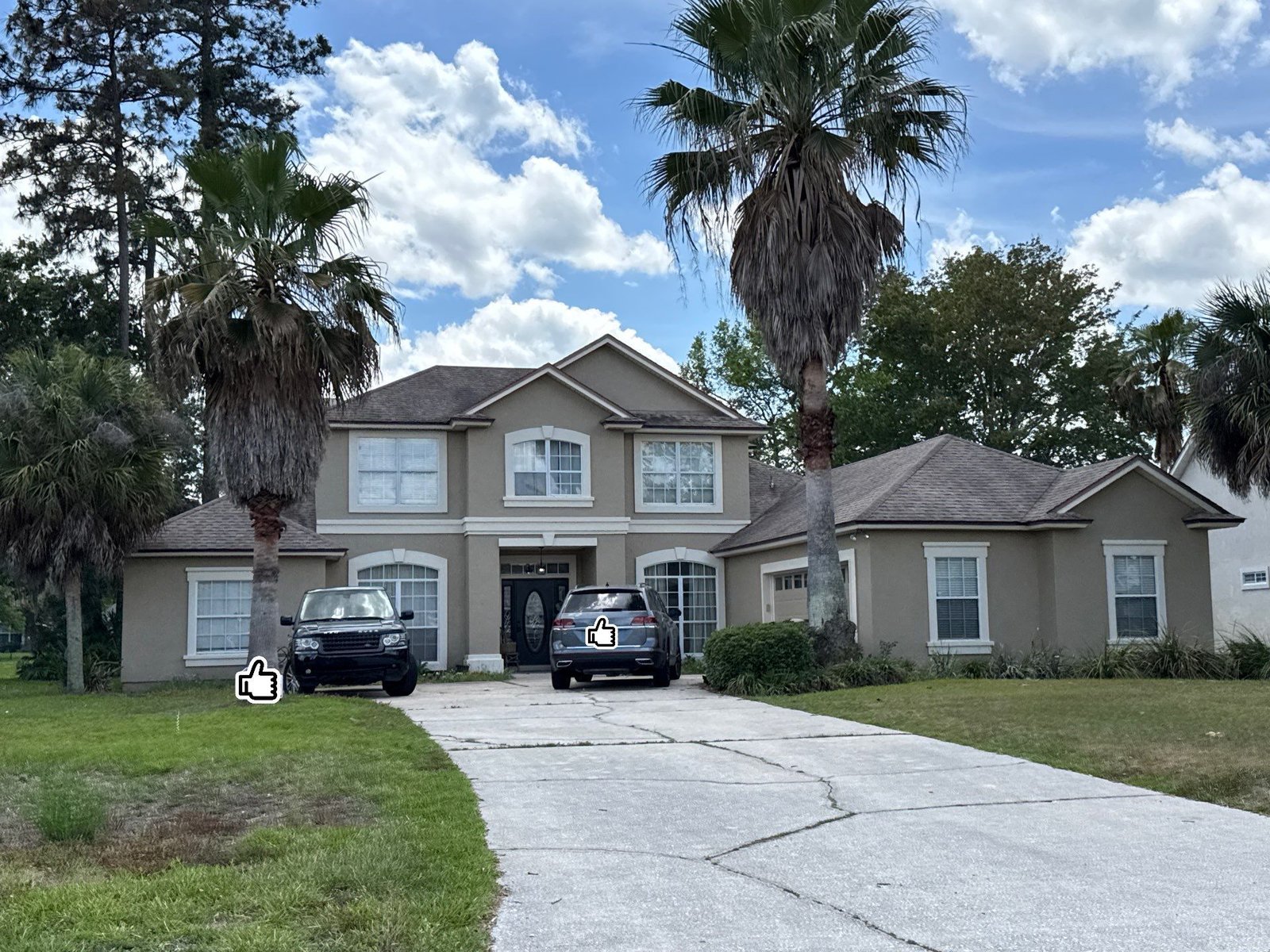 Completed stucco exterior after painting on a home in Eagle Harbor, Fleming Island FL