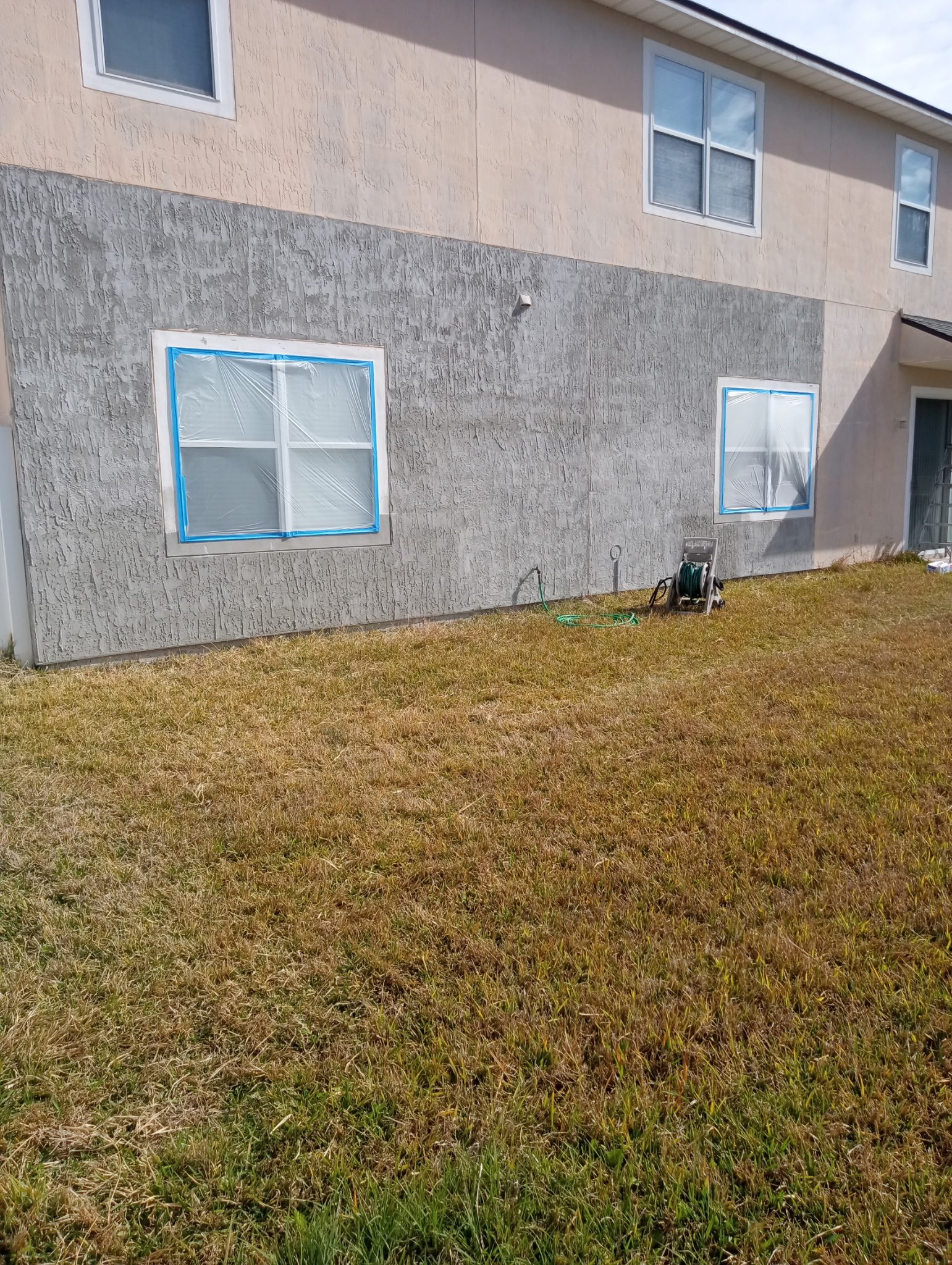 Professional stucco repair on a Northeast Florida home