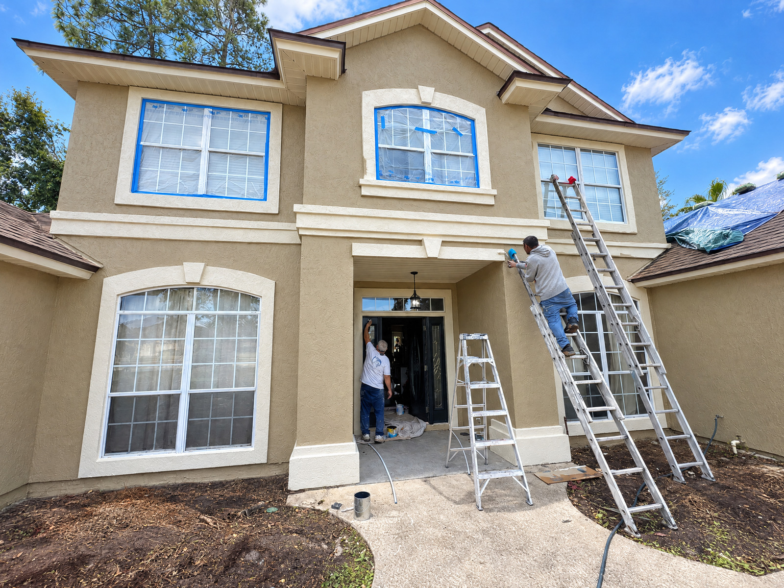 Exterior preparation underway on the front of a stucco home in Eagle Harbor, Fleming Island FL